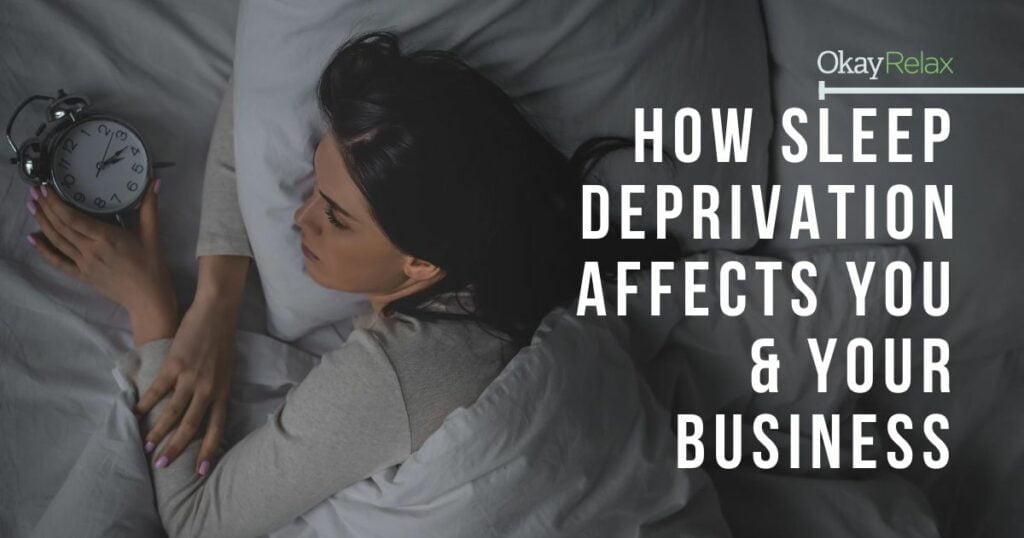 A lady trying to sleep on her bed; she holds and looks at an alarm clock. The blog title reads on the right, "How Sleep Deprivation Affects You & Your Business".