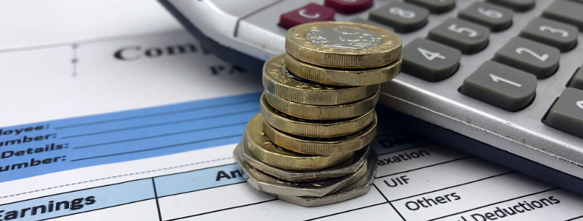 Lower Cost Decorative image of coins, accounting sheets, and a calculator.