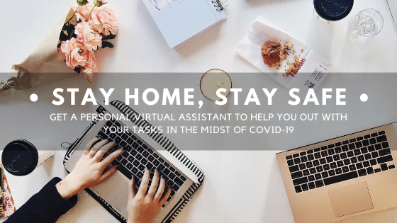 A top-view of a rather aesthetic desk with flowers and candles and 2 people working on their laptops. The blog title is lightly layered over and reads, "Stay Home, Stay Safe: Get A Personal Virtual Assistant To Help You Out With Your Tasks In The Midst of Covid-19".