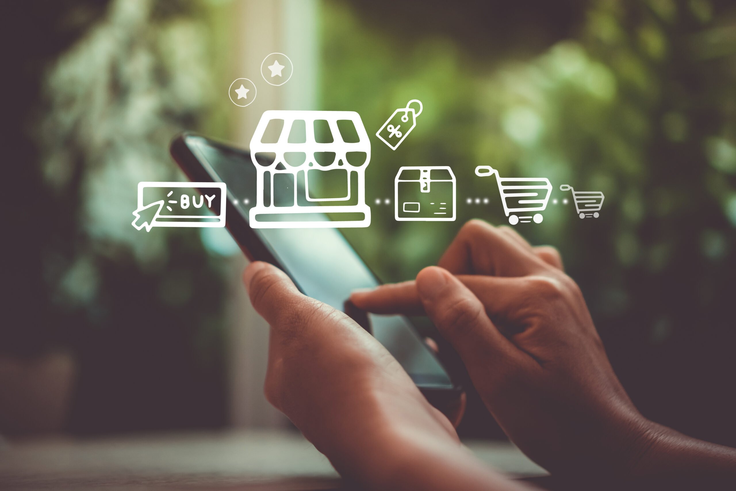 smartphone looking at sales icons