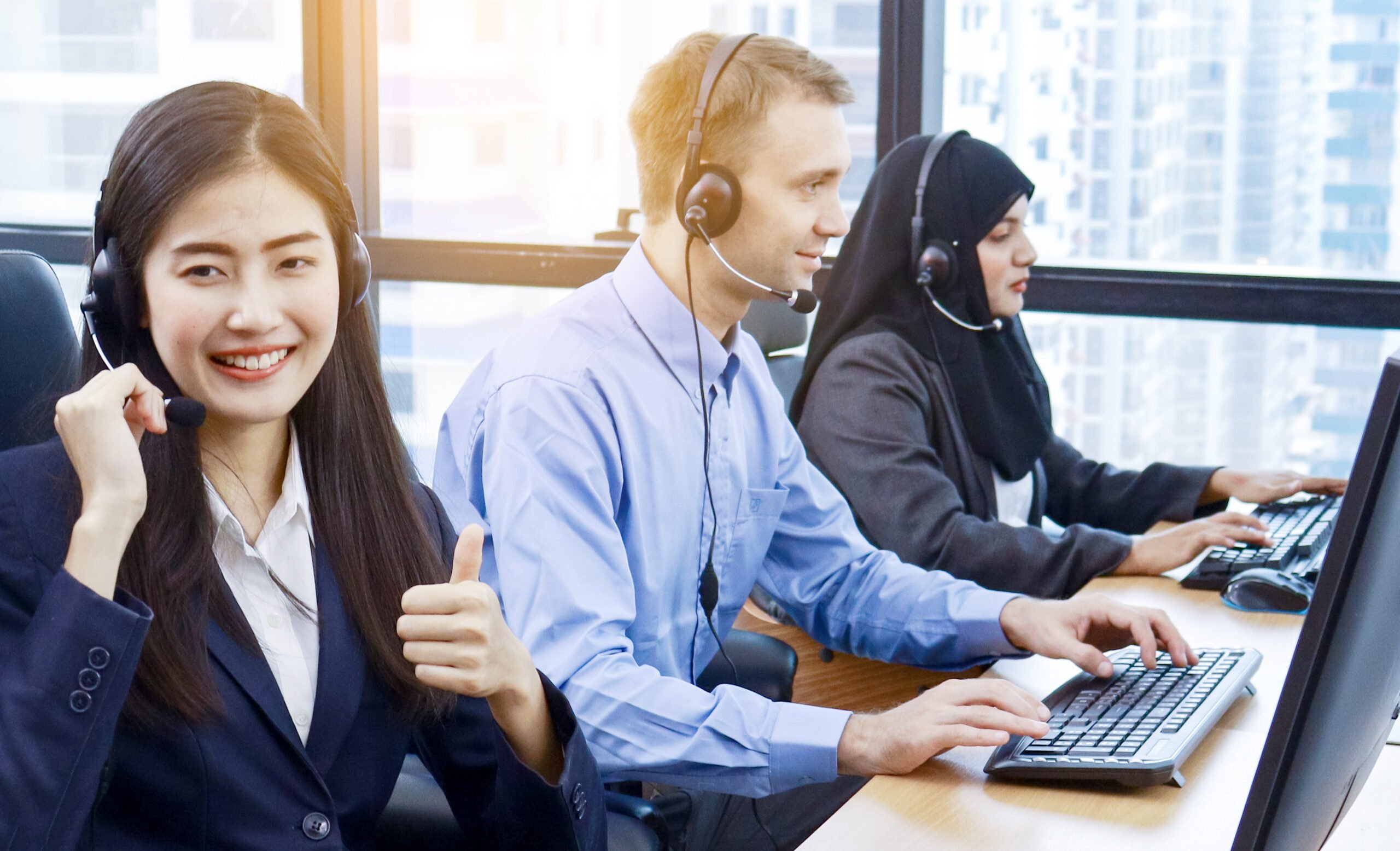 group call center workers customer support headphones