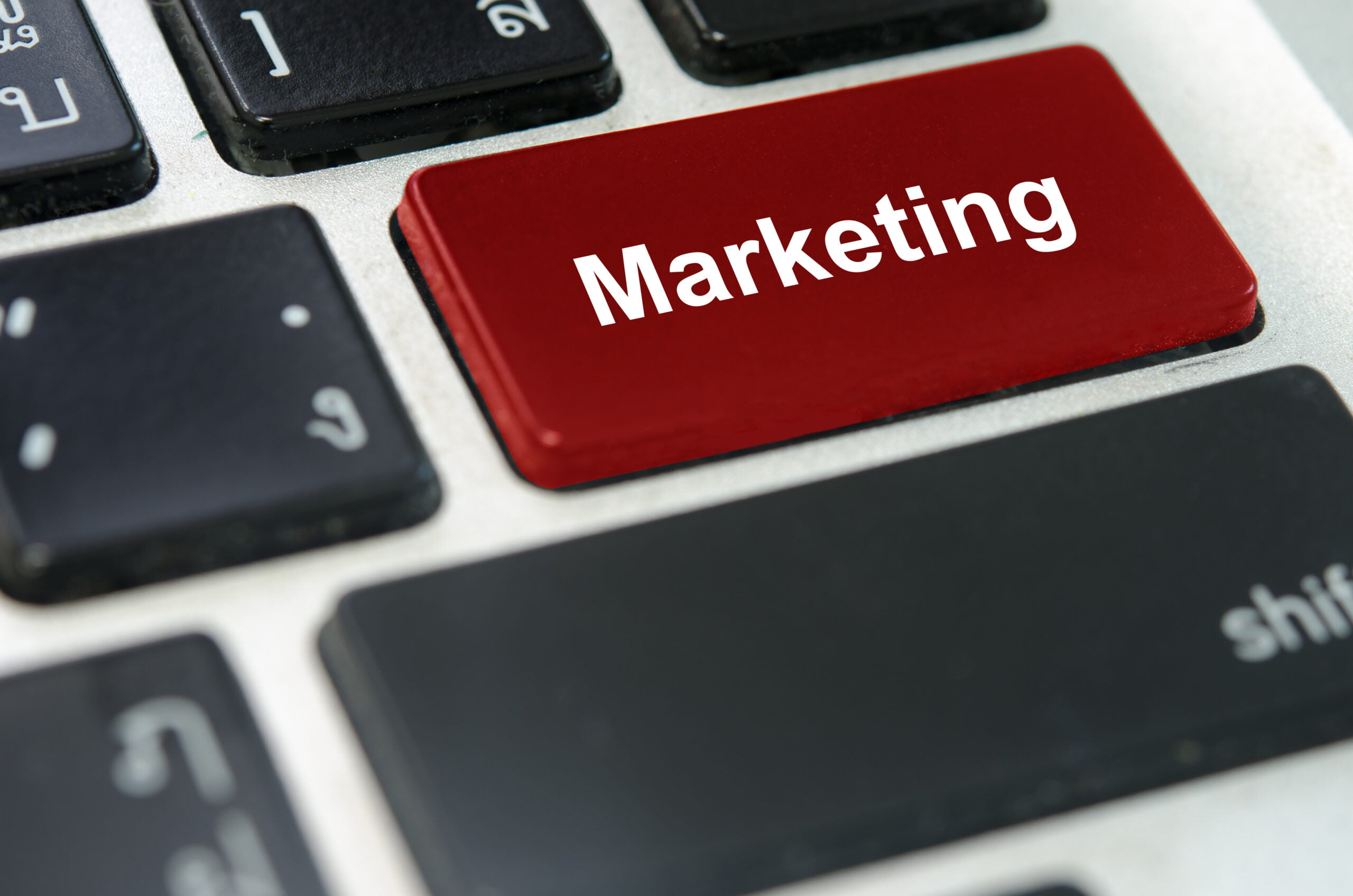keyboard button in red saying the word marketing